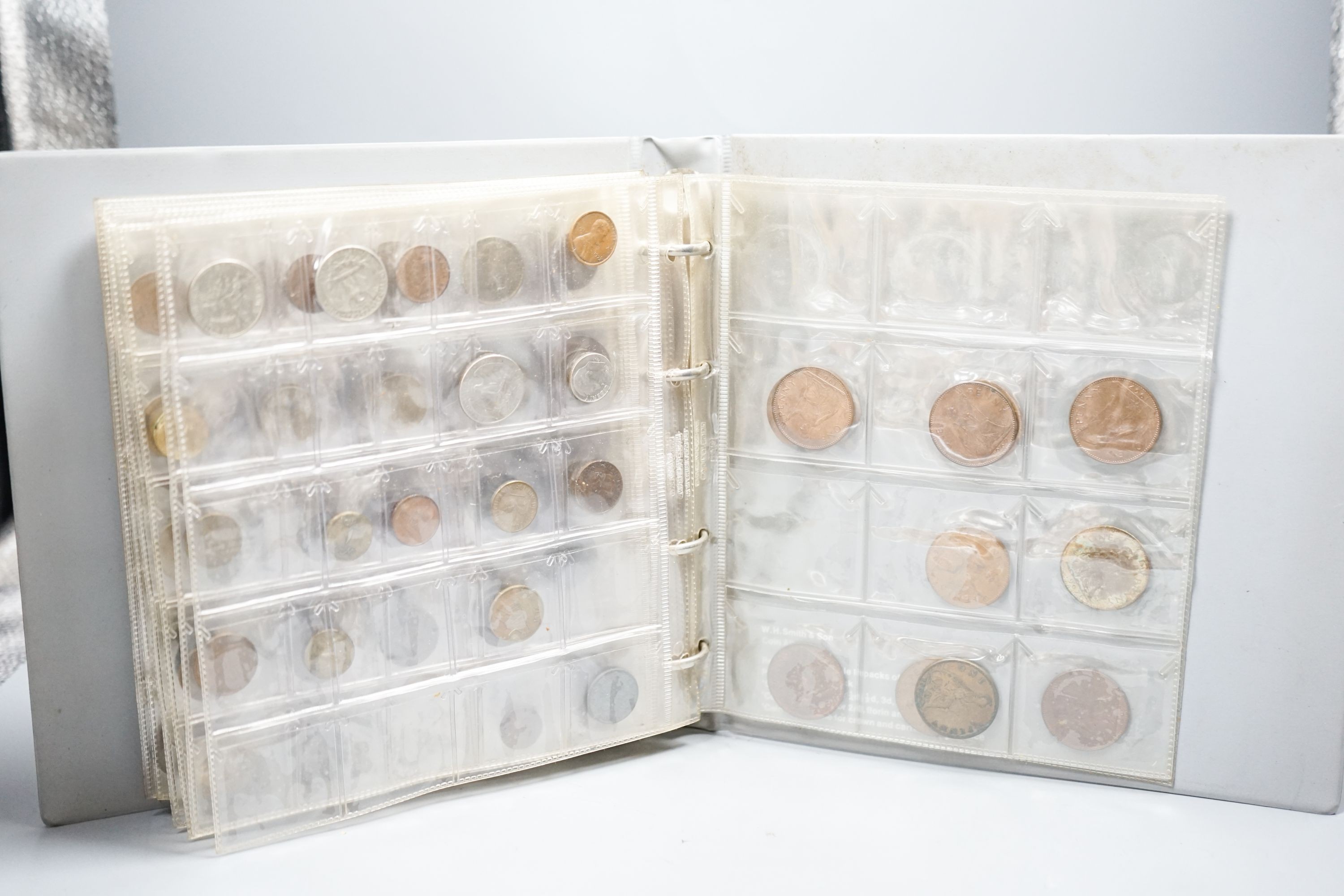 A large collection of UK and World coins, mostly 19th/20th century, in nine albums and loose, 2 boxes